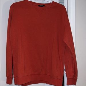 Orange/red sweater